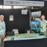 Uatea Salesa and David Hebblewaite at the Pacific Community Booth showcasing the Majuro Freshwater Atoll 3D model, Water and WASH Future, Brisbane, Australia, February 2023