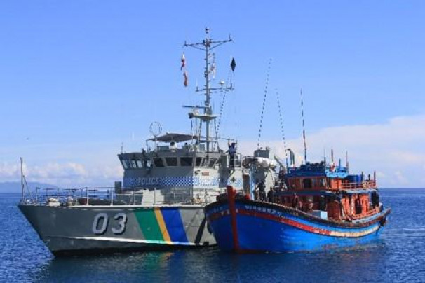 Photo Caption: Solomon Islands patrol boat (03) closely monitoring a Vietnamese vessel (blue boat) which was caught fishing illegally in the Solomon Island waters in 2018. Photo Credit: Pacific Islands Forum Fisheries Agency (FFA)